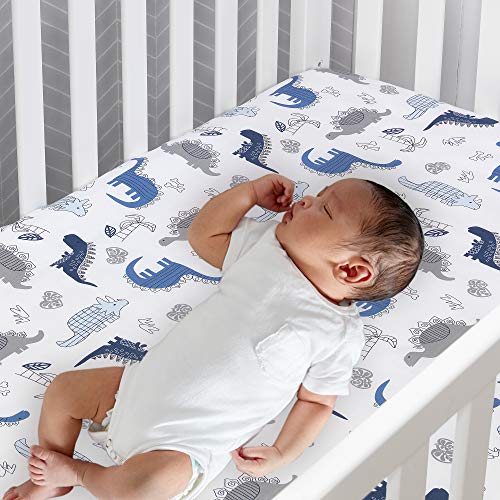 Lambs & Ivy Baby Dino Blue White Dinosaur 6 Piece Crib Bedding Set, Quilt Sheets Crib Skirt Wearable Blanket Wall Decals, 6pc 2 Product: Lambs & Ivy Baby Dino Blue/White Dinosaur Nursery 6-Piece Crib Bedding Set